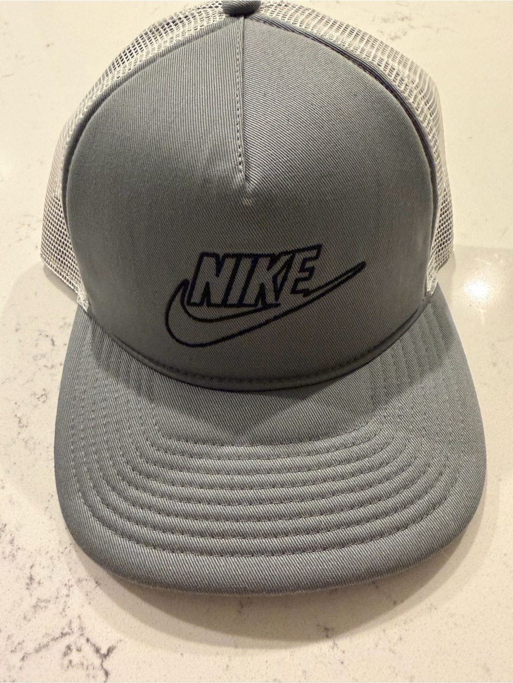 Nike Gray and White Mesh Trucker Cap with Embroidered Logo
